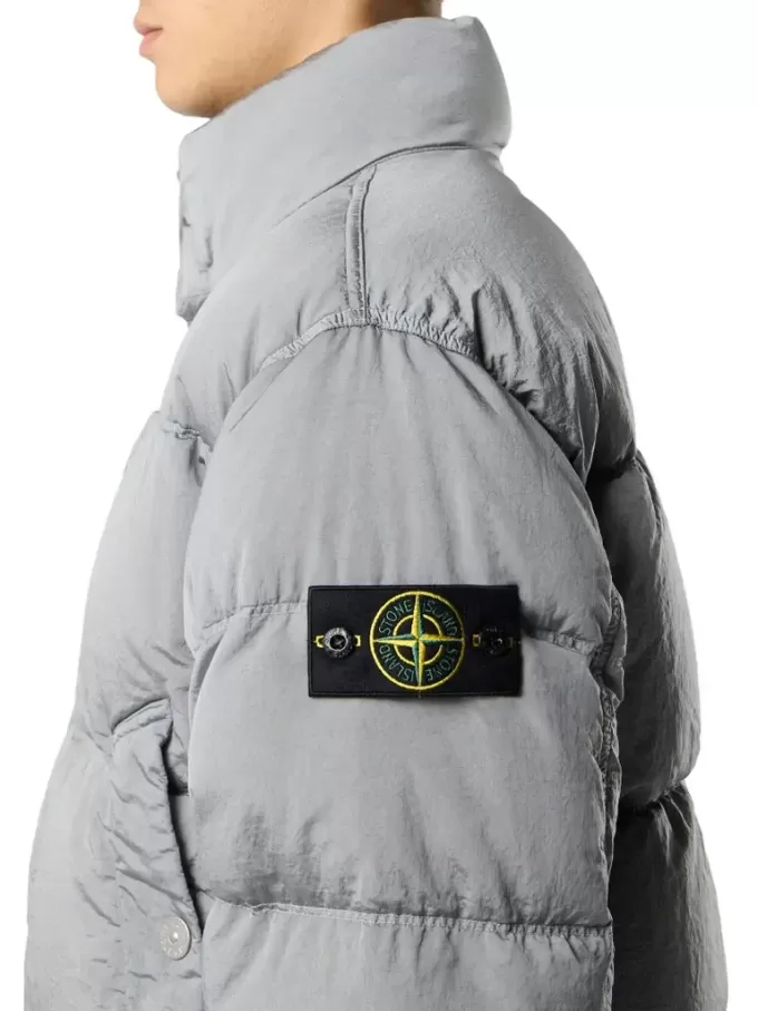 Donsjack met anti-drop en drukknoopzakken Donsjack met anti-drop en drukknoopzakken