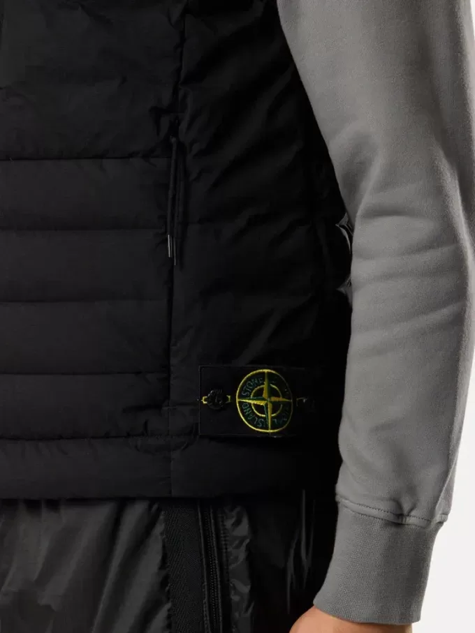 Donsvest met naadloze veertunnels en anti-drop.