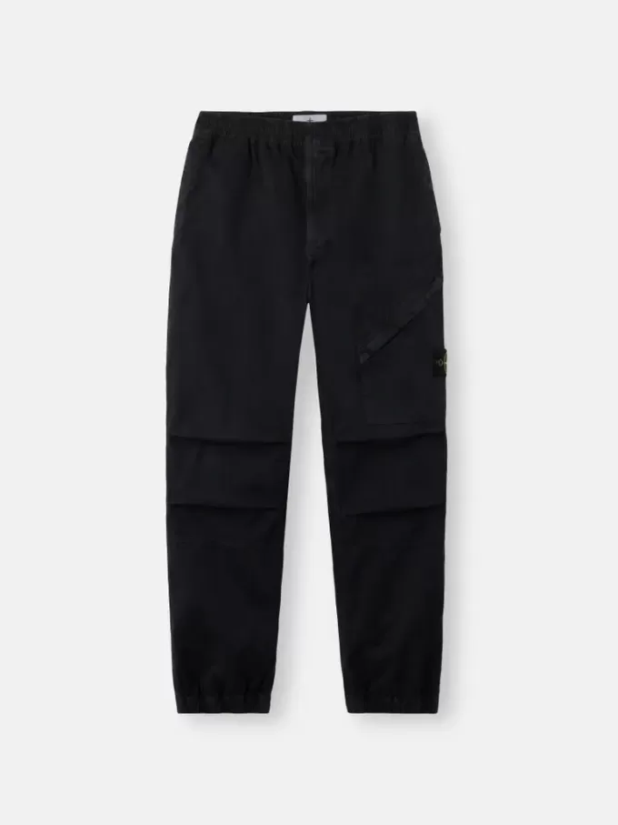 Losvallende joggingbroek met drukknopen en zakken met ritssluiting Losvallende joggingbroek met drukknopen en zakken met ritssluiting