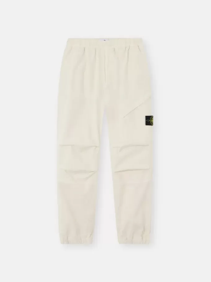 Losvallende joggingbroek met drukknopen en zakken met ritssluiting Losvallende joggingbroek met drukknopen en zakken met ritssluiting