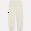 Losvallende joggingbroek met drukknopen en zakken met ritssluiting Losvallende joggingbroek met drukknopen en zakken met ritssluiting