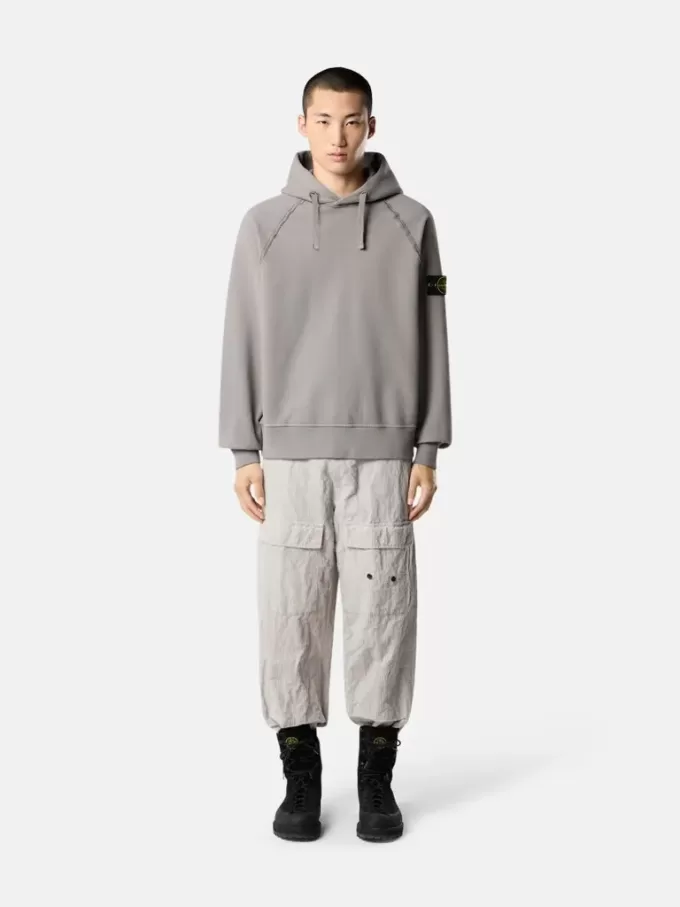 Oversized sweatshirt met capuchon en raglanmouwen.