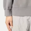 Oversized sweatshirt met capuchon en raglanmouwen.