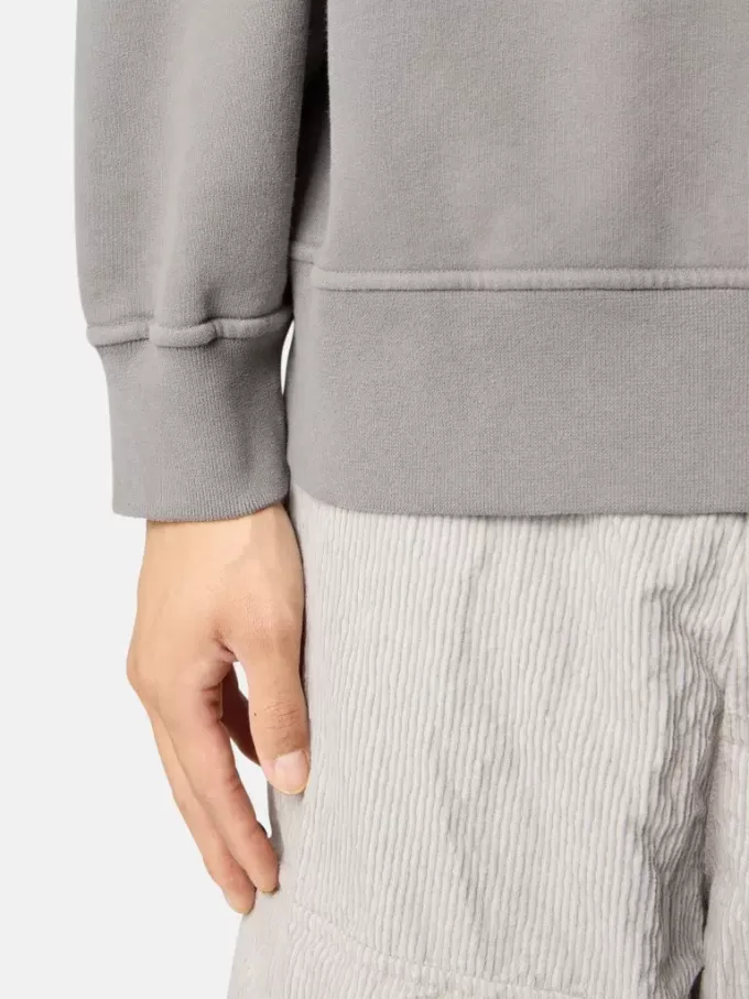 Oversized sweatshirt met capuchon en raglanmouwen.