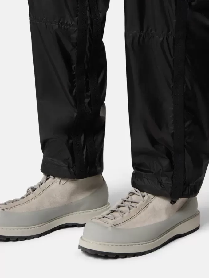 Ruime joggingbroek met ritszakken en verstelbare boorden Ruime joggingbroek met ritszakken en verstelbare boorden