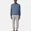 Slim-fit joggingbroek met zakken en trekkoord in de taille. Slim-fit joggingbroek met zakken en trekkoord in de taille.