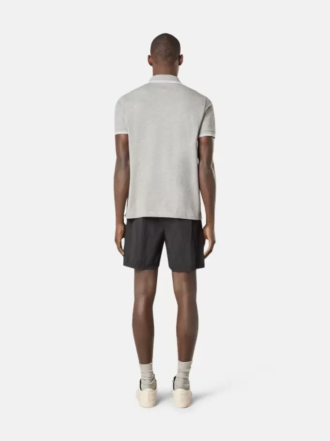Slim-fit poloshirt met korte mouwen en gestreepte details