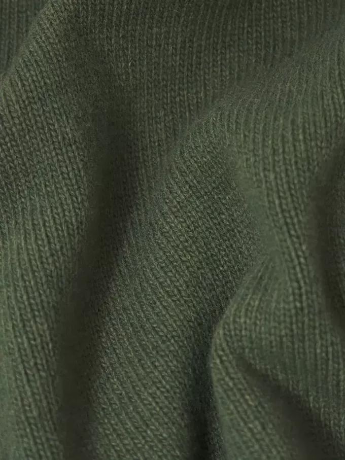 Sweater met knopen en vilten boorden